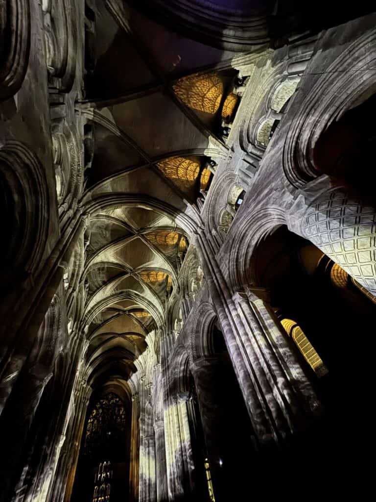 View of ceiling vaults of Durham Cathedral during Everyone Ever Waterfall scene